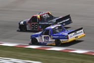 Ty Majeski (98) leads Christian Eckes (19) during the Truck Series Toyota 200. Source: Imagn